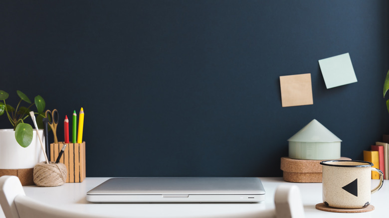 Home office, dark blue wall