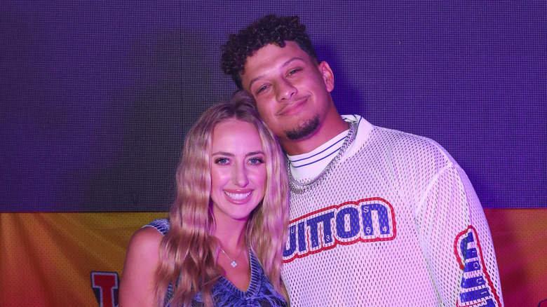 Brittany and Patrick Mahomes posing