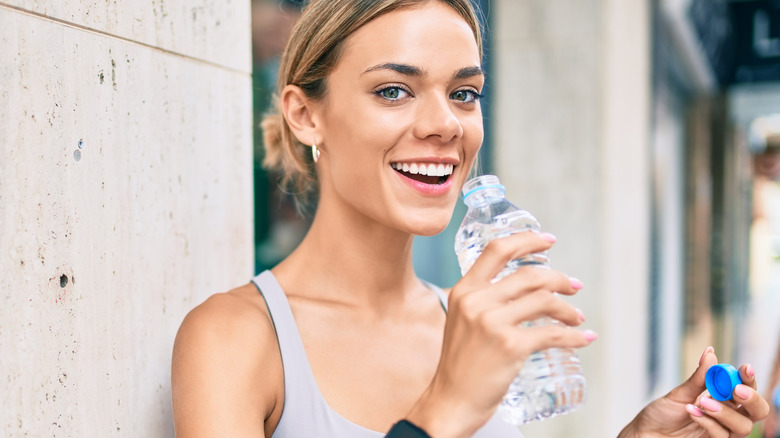 Woman drinking collagen water