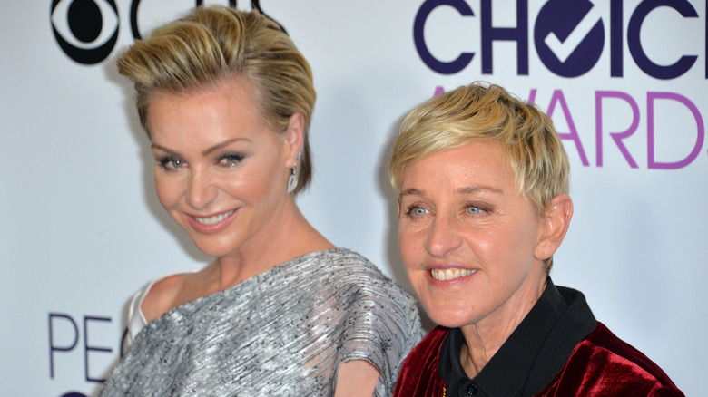 Ellen DeGeneres and Portia de Rossi smiling 