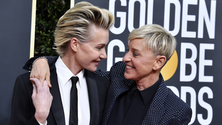 Ellen and Portia de Rossi smiling at each other