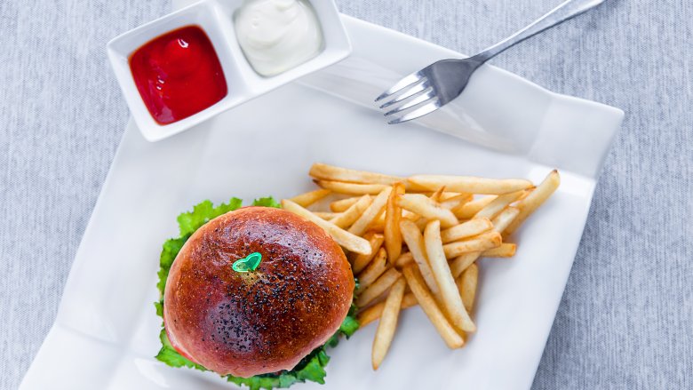 burger and fries with ketchup and mayo