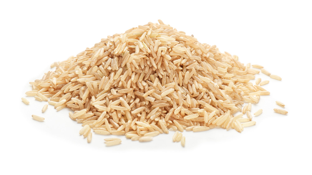 Brown rice on a white background