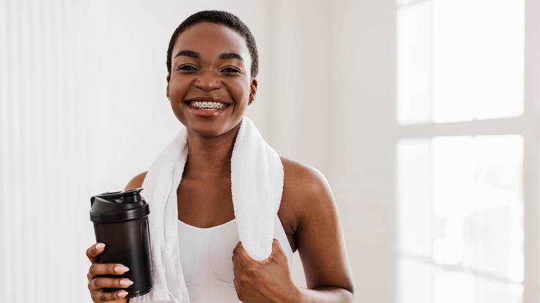 woman smiling at gym