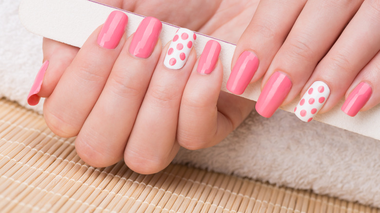 Pink and perfect nail filing.