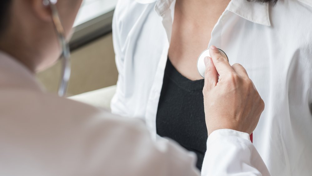 woman getting checked for heart disease