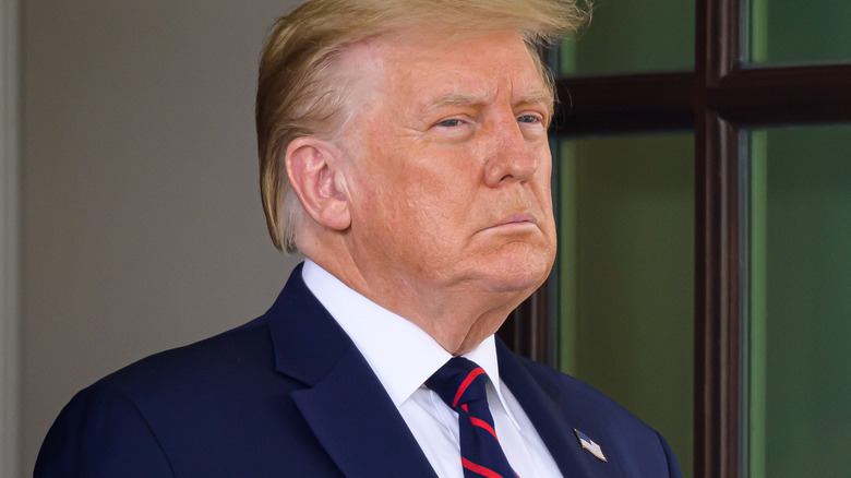 Donald Trump looking solemn