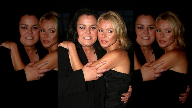 Kelly Ripa hugging Rosie O'Donnell