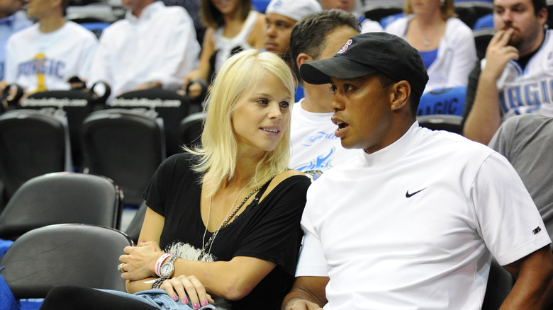 Tiger Woods and Elin Nordegren at sports event