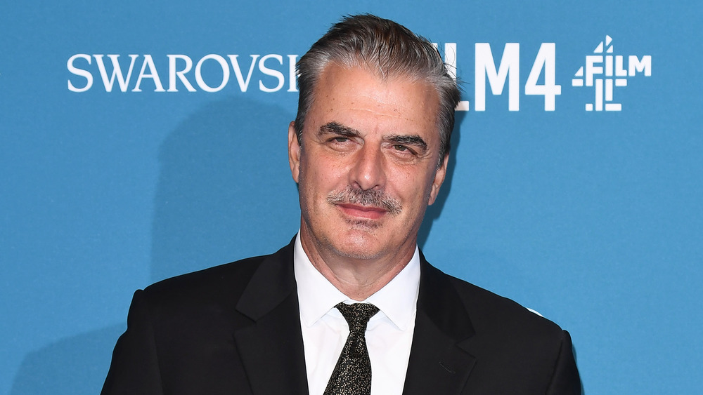 Chris Noth in a suit and tie