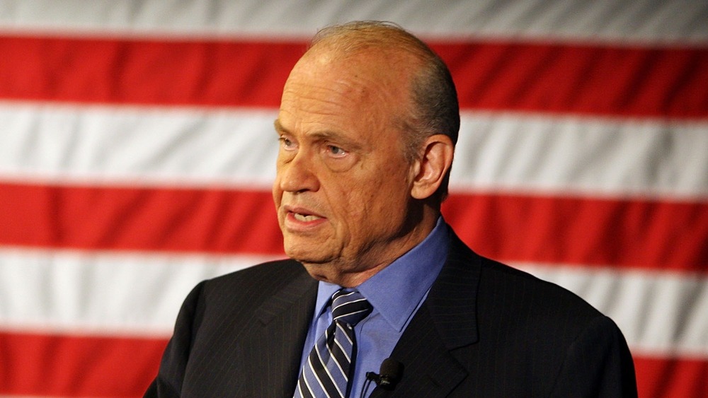 Fred Thompson in front of an American flag