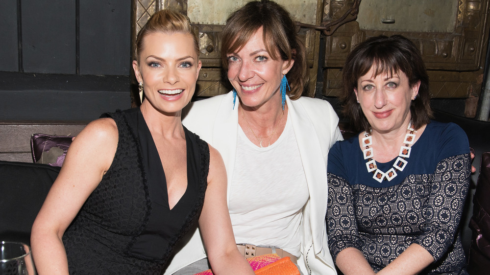 Alison Janney smiling with Jamie Presley and Beth Hall