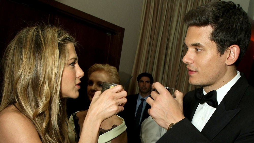 Jennifer Aniston and John Mayer toasting at the 2009 Oscars 