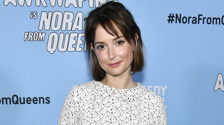 Milana Vayntrub smiling on the red carpet