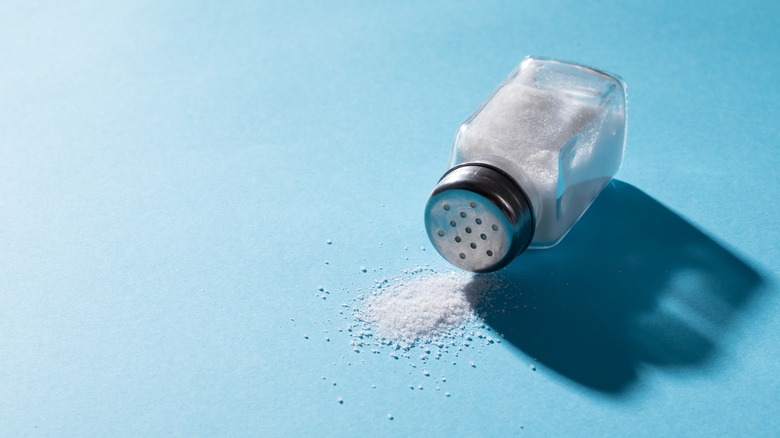 Spilled salt from salt shaker 