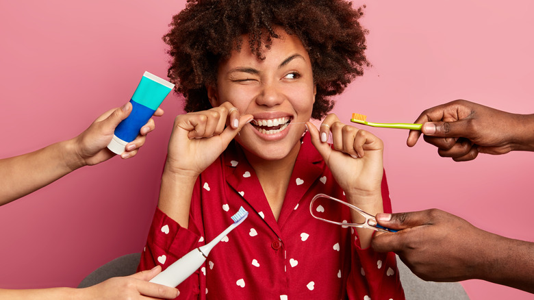 Woman concerned about oral hygiene 