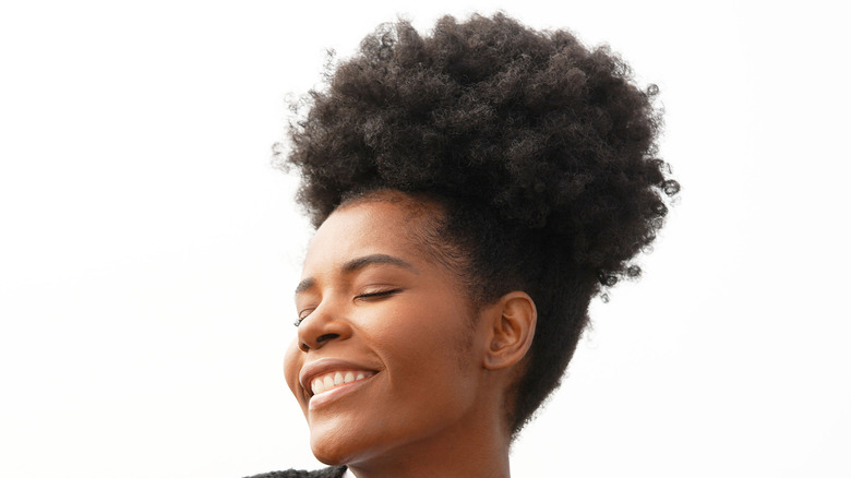 Woman with high puff