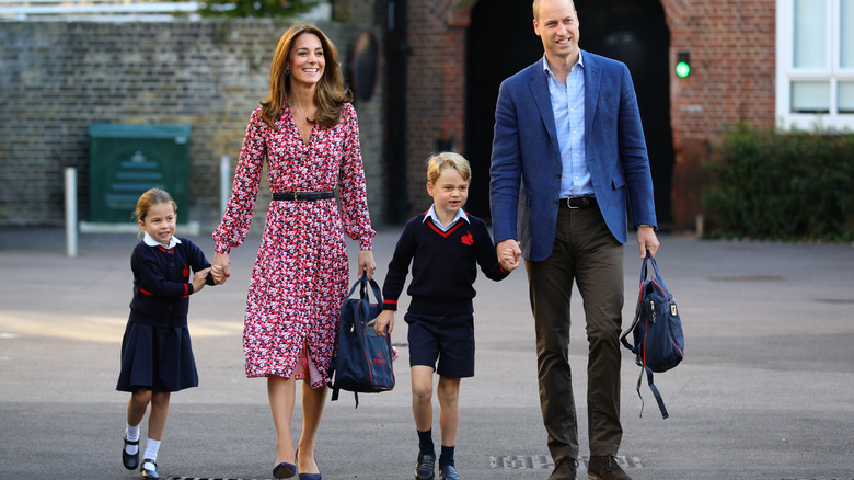 The Cambridge family walking to school