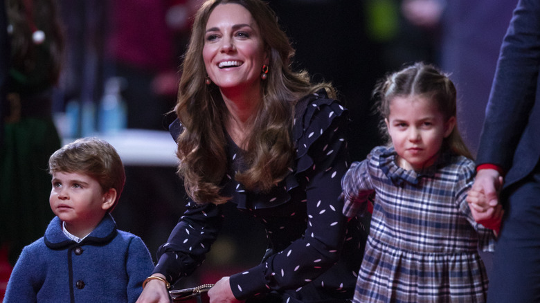 Princess Charlotte with her mom and brother, Louis