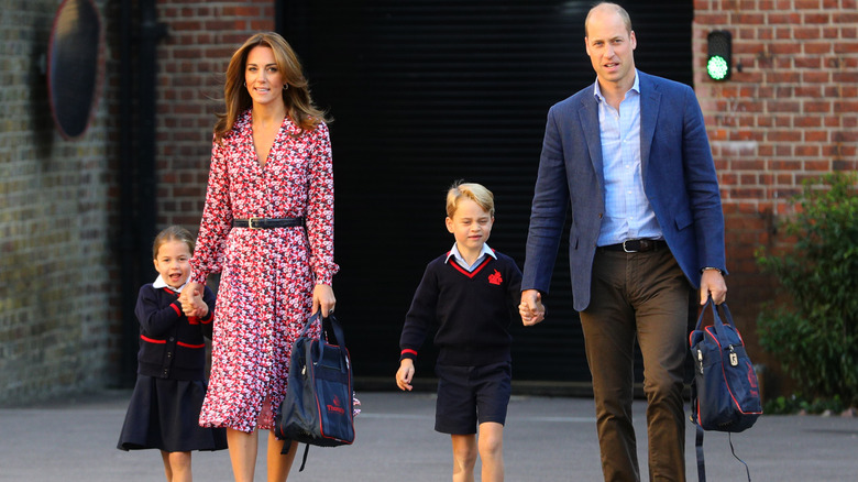 Kate Middleton and Prince William with two of their children