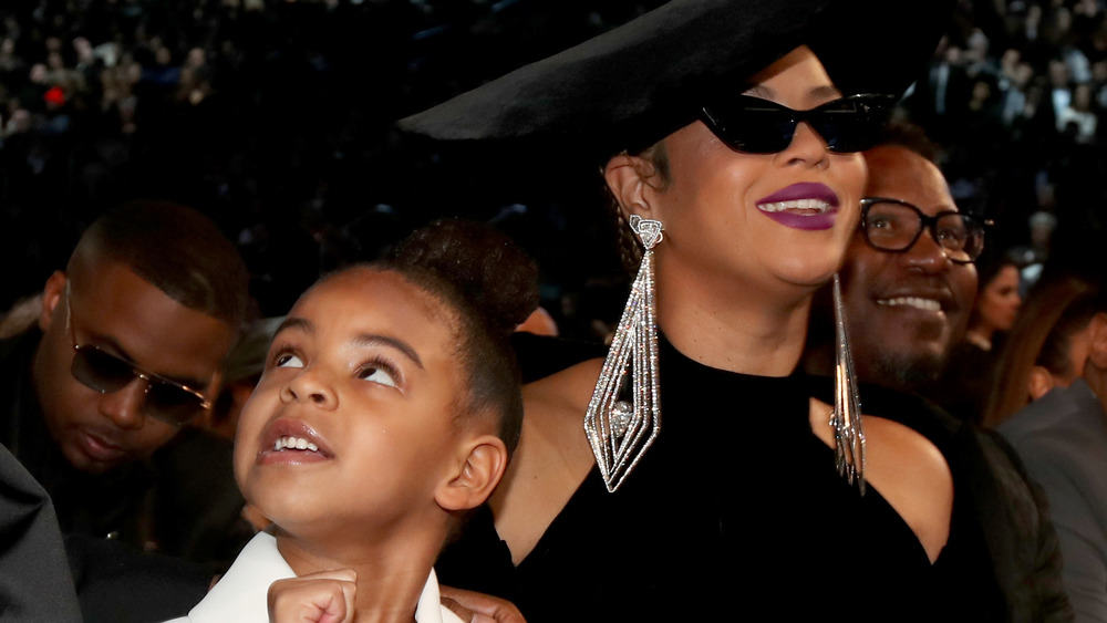 Blue Ivy and Beyonce at event