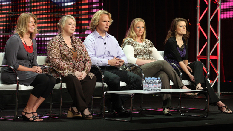 The cast of Sister Wives speaks onstage at an event