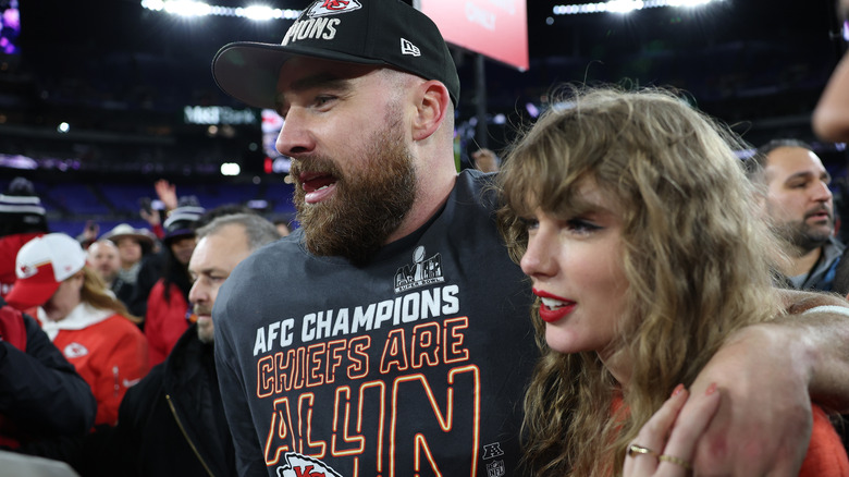 Taylor Swift and Travis Kelce after the Chiefs win the AFC Championship