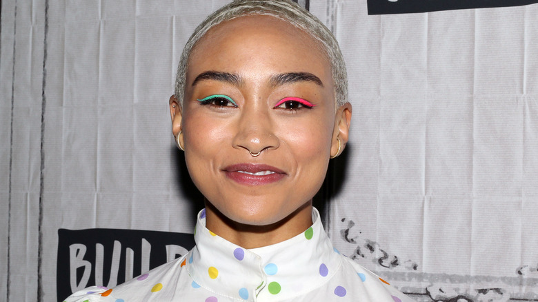 Tati Gabrielle wearing two different colored eyeliner shades on the red carept