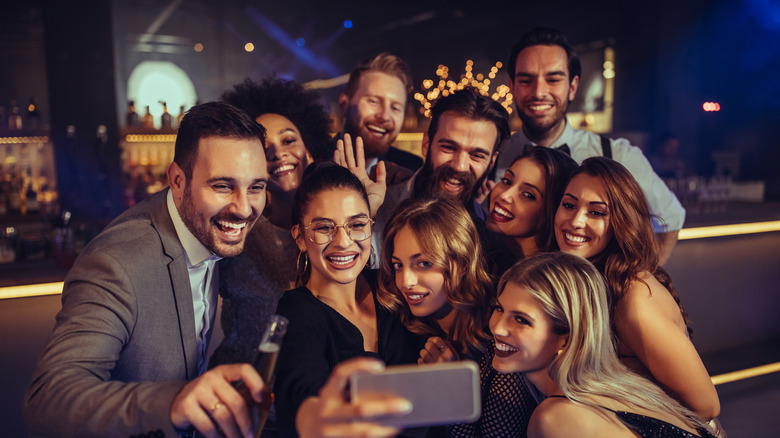 Friends taking a group selfie