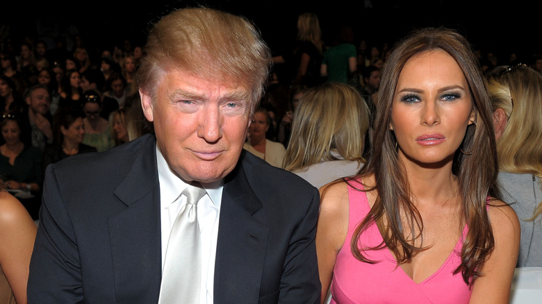 Donald and Melania Trump staring at the camera