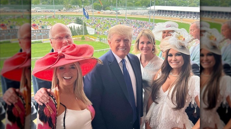 Pam Bondi, Donald Trump, and Kimberly Guilfoyle at the 2022 Kentucky Derby