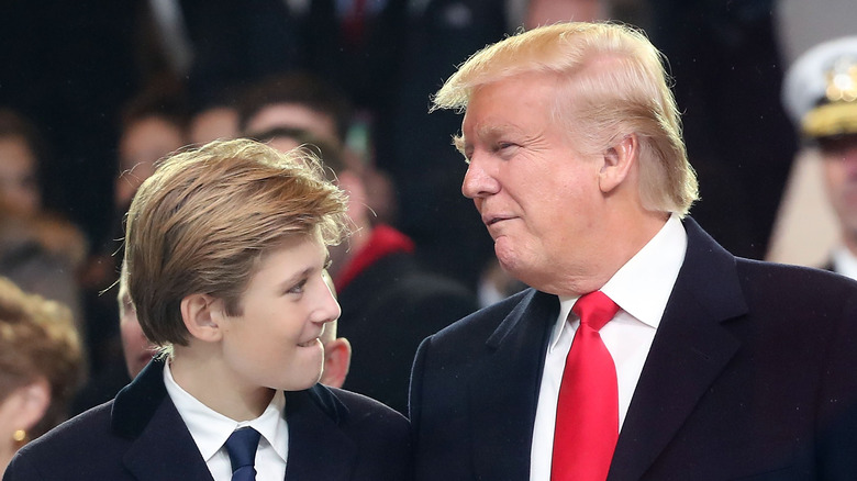 Barron Trump looking at Donald Trump