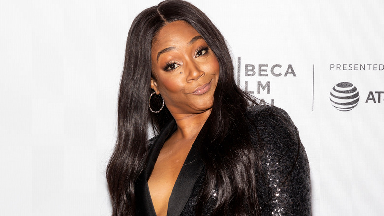 Tiffany Haddish smirking at Tribeca Film Festival 