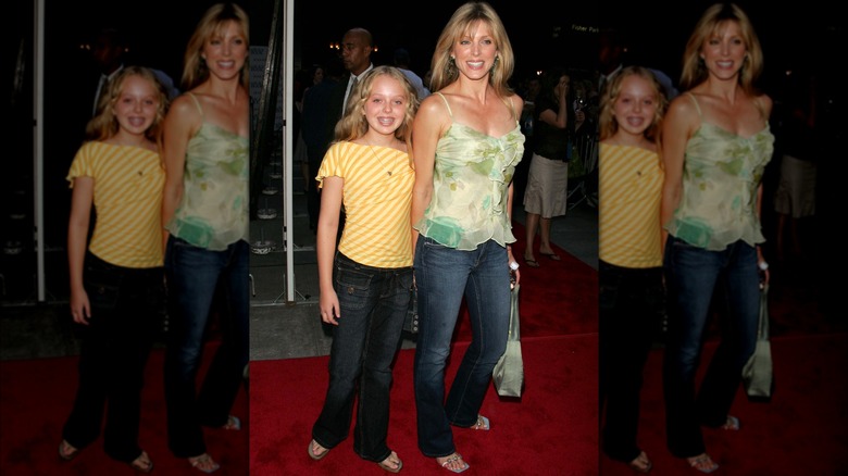 Marla Maples (R) and daughter Tiffany Trump smile at Little Black Book premiere in New York City (2004)