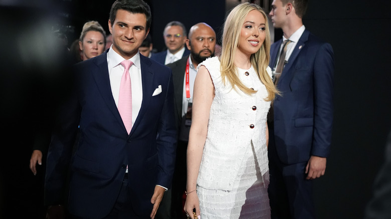 Tiffany Trump and her husband Michael Boulos (L) attend the second day of the Republican National Convention (2024)