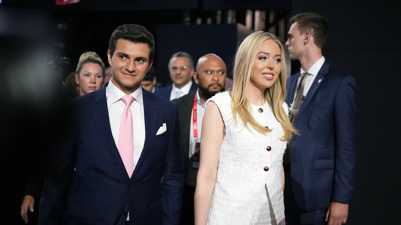 Tiffany trump and husband walking