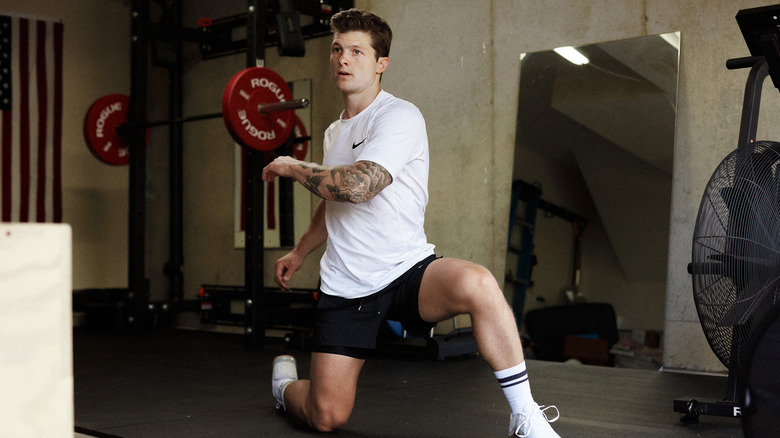 Josh Herbert exercising in weight room