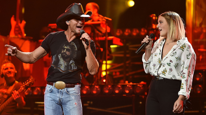 Tim McGraw performing with daughter Gracie McGraw