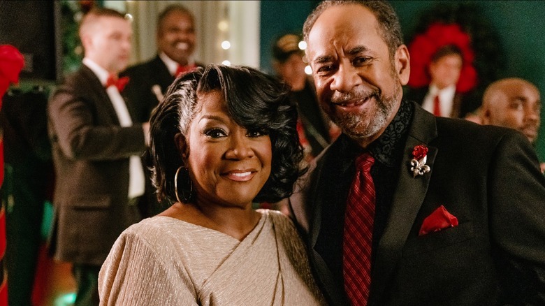 Patti LaBelle and Tim Reid smiling on set of A New Orleans Noel