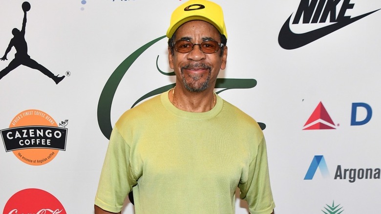 Tim Reid posing in a hat