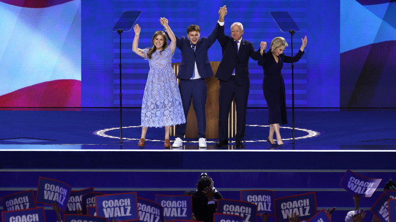 Tim Walz on stage with family