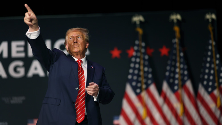 Donald Trump at rally pointing finger at audience