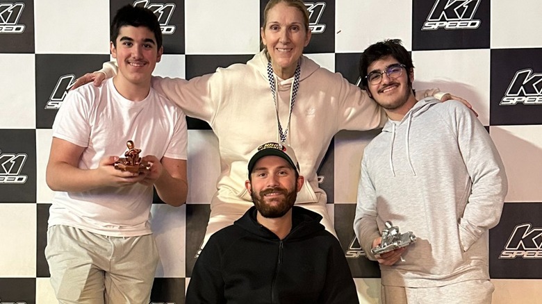 Céline Dion, Eddy Angélil, Nelson Angélil, and René-Charles Angélil smiling