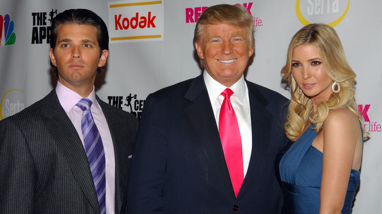  Don Trump Jr., Donald Trump, and Ivanka Trump pose at the "Celebrity Apprentice" finale 