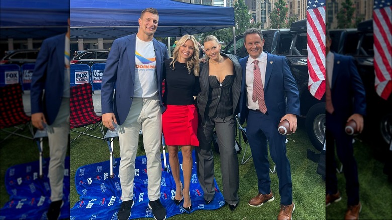 Ainsley Earhardt posing with others in NYC