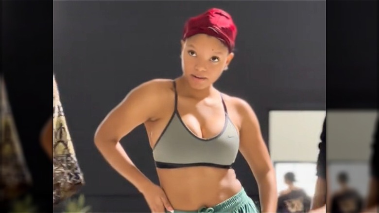 Halle Bailey hand on hip