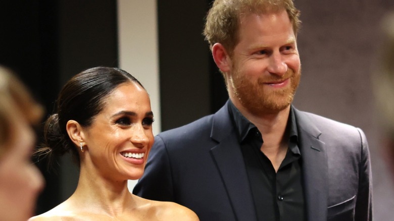 Meghan Markle and Prince Harry smiling