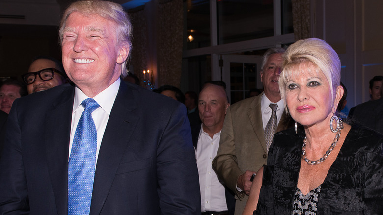 Donald Trump smiling standing next to Ivana Trump