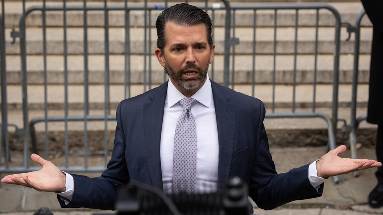 Donald Trump Jr. with hands spread