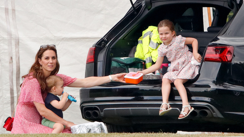 Kate Middleton sitting with children 